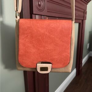 Orange and Cream Crossbody Bag with Flap Closure and Soft Suede-Like Material